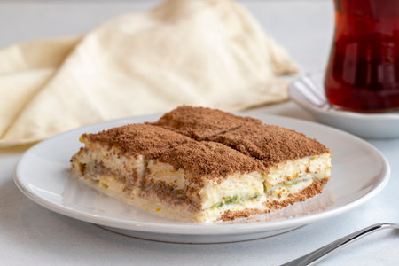 Cold baklava on a white background. Turkish sweet dessert concept. plate of sliced forest fruit...