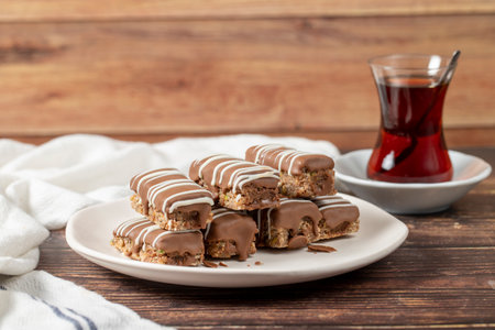 Chocolate covered cookies. Bakery products. Chocolate cookies on wood background. close up