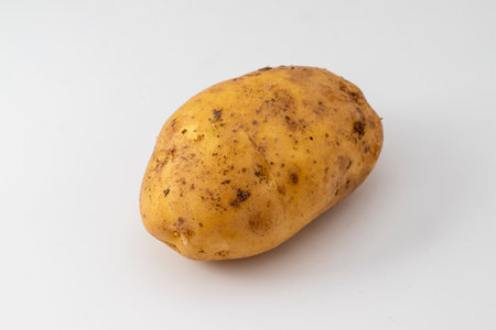 Close-up potatoes on white backgroundの写真素材