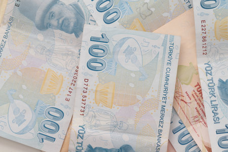 100 Turkish lira and 50 Turkish lira banknotes lie in stacks. Rich life conceptual background