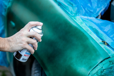 Paint master who renews the paint of the car. selective focusの写真素材