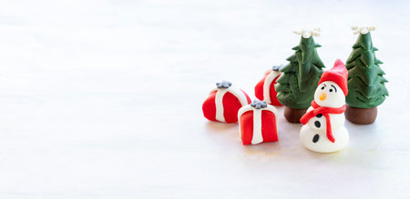 New Year's cookies. Snowman cookie, Christmas tree cookie, gift wrap cookie. Christmas concept food. copy spaceの写真素材