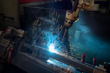Industrial welding robot. Robot coded to weld is working. Digital production operation. Industry 4.0