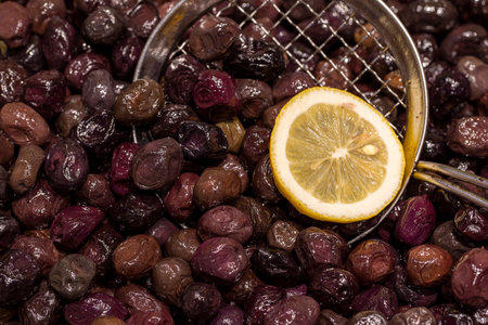 black olives Pile of organic olives close-up. food backgroundの写真素材