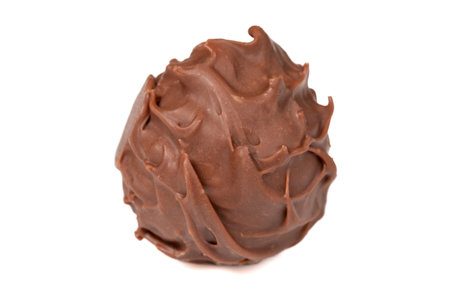 Praline chocolate. Chocolate with truffles or praline filling isolated on white background. close upの写真素材
