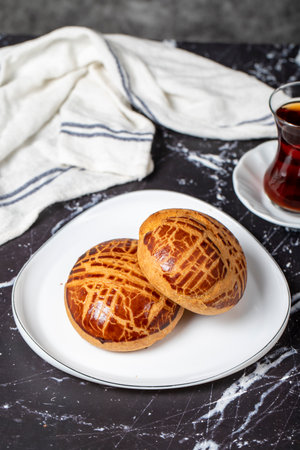 Pastry on dark background. Local name plain pogacaの写真素材
