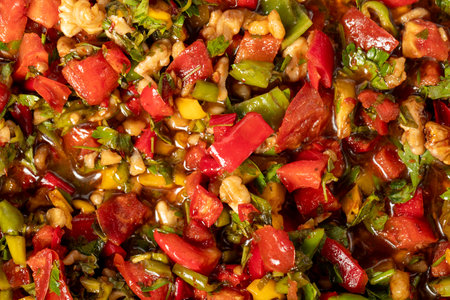Gavurdagi salad. Salad prepared with tomato, cucumber, parsley, pepper, onion, walnut, pomegranate syrup and olive oil. food background .Local name gavudaÄÄ± saladの写真素材