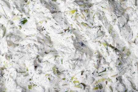 Tzatziki or cacik. Healthy appetizers. An appetizer prepared with dried mint, salt, olive oil and yogurt. food background. Local name dry cacikの写真素材