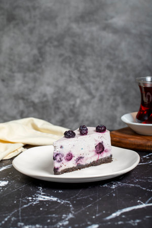 Blueberry cake. Blueberry fruit slice cake on dark backgroundの写真素材
