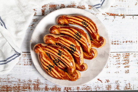 Turkish catal pogaca. traditional flavors. Pastry Catal on wooden background. Top view