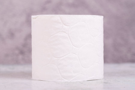 Toilet paper. Toilet paper rolls on gray background