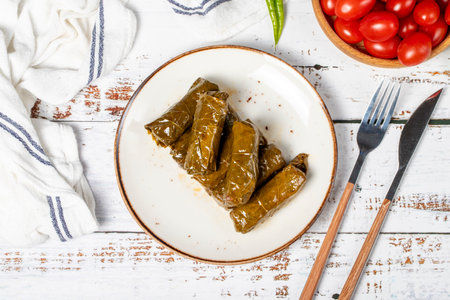 Stuffed grape leaves with olive oil. Dolma prepared with grape leaves and rice. Stuffed grape leaves...