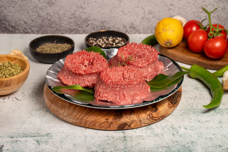ground beef Butcher products. Raw ground beef on stone backgroundの写真素材