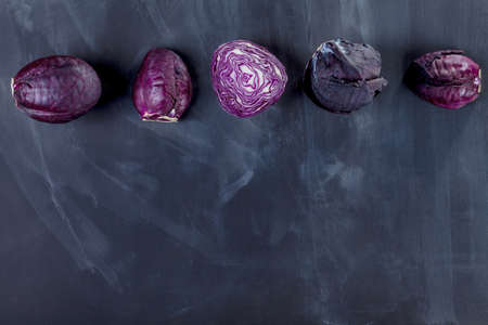 Red cabbages on the top of blackboardの写真素材