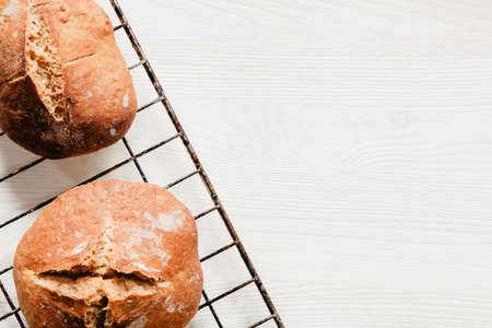 Traditional Irish soda bread made for St. Patrick's Day on white wooden tableの写真素材