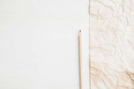 Piece of paper with pencil to noteの写真素材