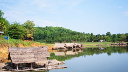 bamboo Houseboat raft floating on river for relax time landscape nature mountain backgroundの写真素材