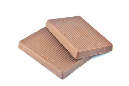 biscuits chocolate isolated / pieces chocolate milk bar isolated on white backgroundの写真素材