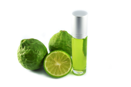 Kaffir lime extract oil on White background / bergamot essential oil Thai herbs medicinal properties used to make oil extracts Kaffirの写真素材
