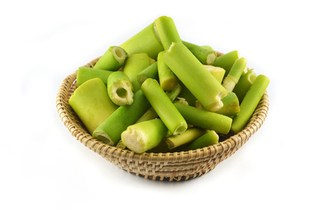 fresh bamboo shoot isolated / young of green bamboo shoot organic nature in basket isolated on white backgroundの写真素材