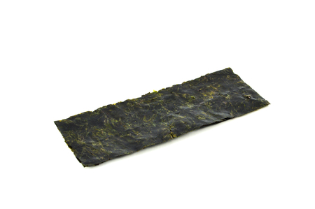 Kelp sheet isolated / dried crispy seaweed kelp for snack isolated on white backgroundの写真素材