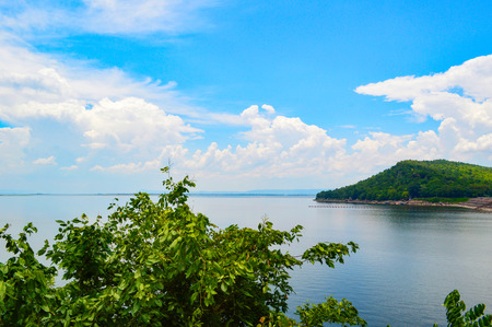 landscape viewpoint lagoon with mountain and blue sky background at Ubol Ratana Dam Tourist attraction khonkaen thailandの写真素材