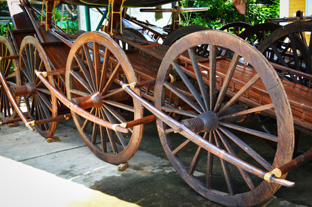 vintage cart wheel / old wooden wheel antique show in the parkの写真素材