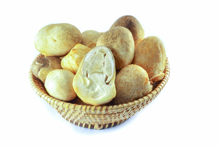 basket straw mushrooms in isolated / fresh of straw mushrooms slice for cook food isolated on white backgroundの写真素材