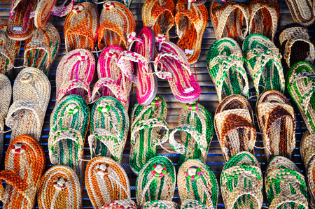 Colorful flip flop or sandal / flip flop weave from Natural materialsの写真素材
