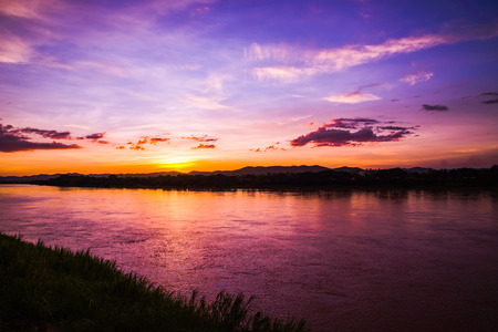Sunset River / Beautiful landscape dramatic sky purple and yellow at Mekong River