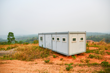 box container office / Administration settlement office at industrial site building outdoors on hill mountainの写真素材