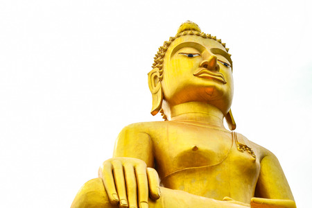 The big golden buddha statue sitting isolated on white backgroundの写真素材
