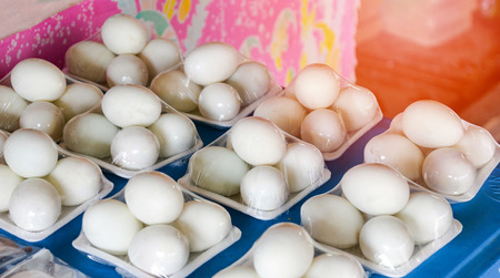 Duck eggs on plastic package on tabel for sale in the local market / salted egg
