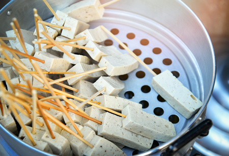 Steamed white sausage fermented pork in street food market thailandの写真素材