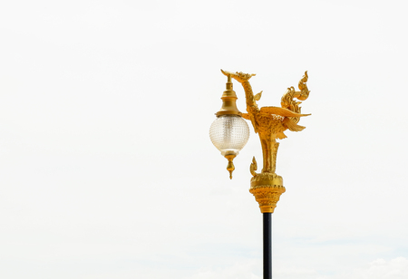 Thailand golden swan with lamp post isolated on white backgroundの写真素材
