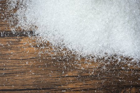 MSG / Heap of white monosodium glutamate on wooden backgroundの写真素材