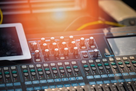 Professional audio mix sound control panel console / Sound technician and lights equipmentの写真素材