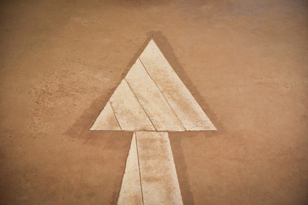 Arrow road forward signs on floor cement roadの写真素材