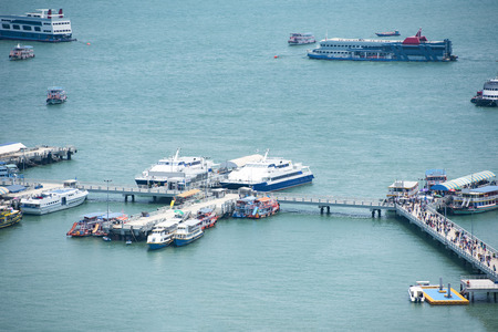 Ferry Boat harbor for people residents the tourist sea and ocean travel / Port of Ferry Terminal transport water taxiの写真素材