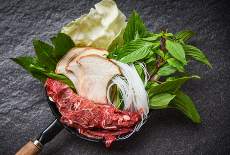 Sukiyaki set Shabu shabu with meat beef slice noodle mushroom and fresh vegetables on pot Japanese foods Asian cuisineの写真素材