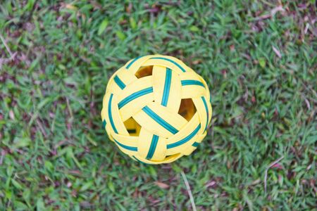 Sepak Takraw ball on green grass field / rattan ball sport outdoorの写真素材