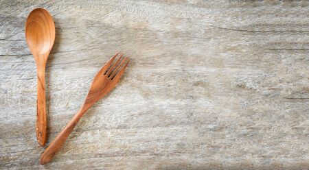 Wooden spoon and fork kitchenware set on wooden table / Zero waste use less plastic conceptの写真素材