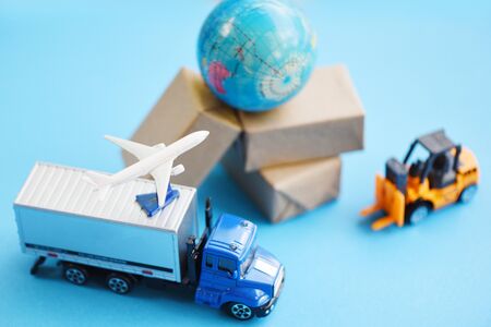 logistics transport import export shipping service Customers order things from via internet International shipping online concept Air courier Cargo plane boxes packaging freight forwarder to worldwidの写真素材