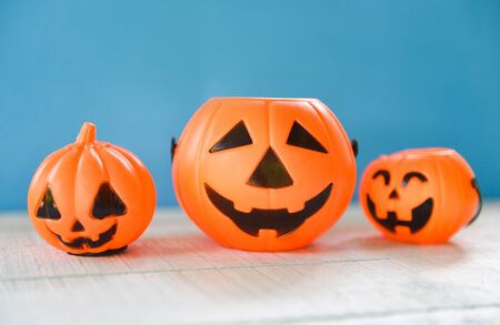 Halloween background blue decorated holidays festive concept / jack o lantern pumpkin halloween decorations for party accessories object on woodの写真素材