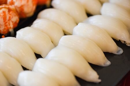 Japanese food sushi roll in the restaurant sushi menu set japanese cuisine fresh ingredients on tray , selective focusの写真素材