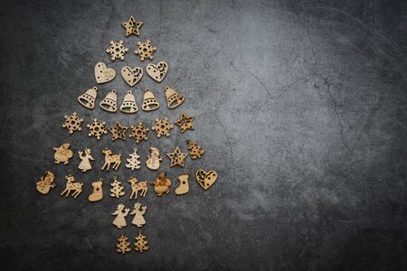 top view of christmas tree holiday background with christmas object decorations on dark background for festive and happy new yearの写真素材