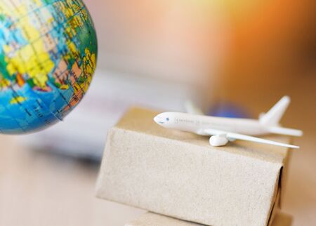 logistics transport import export shipping service Customers order things from via internet International shipping online concept Air courier Cargo plane boxes packaging freight forwarder to worldwidの写真素材