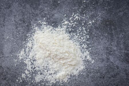 Pastry flour on gray background, top view homemade flour for cooking ingredients on kitchen table