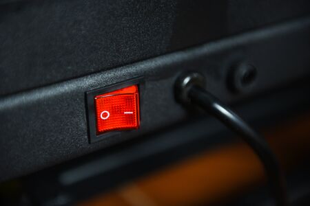red switch on off in the electronics devicesの写真素材