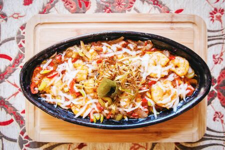 Shrimp pasta with onion pepper tomato on bowl table restaurant in the Turkish foods in Turkey の写真素材